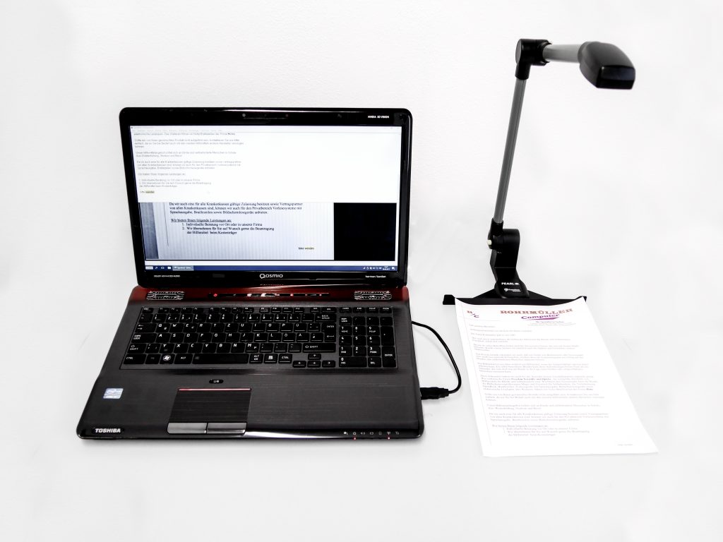Bild zeigt das computergebundene Vorlesesystem Pearl in Kombination mit einem Notebook.